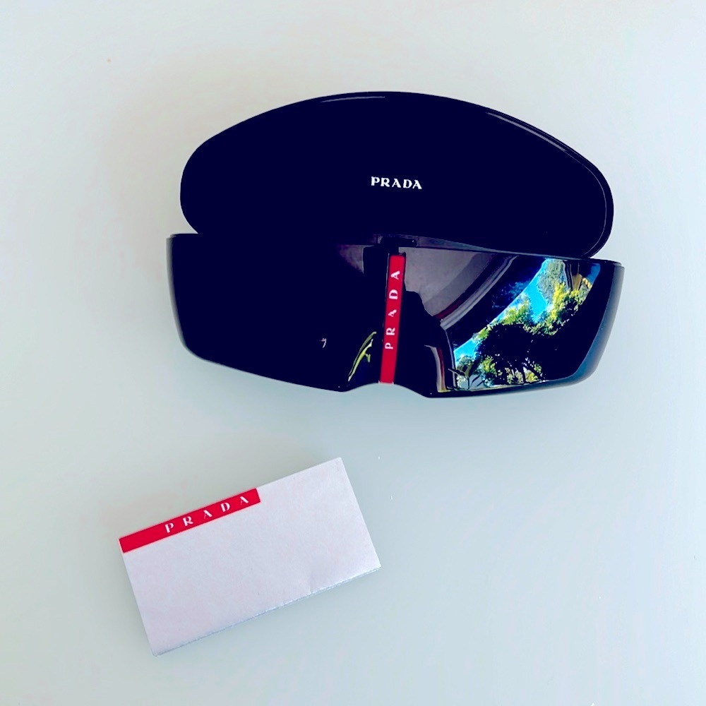 Prada sunglasses case and paperwork